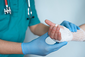 Doctor examining wrist