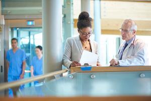 physician with office manager
