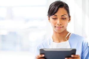 nurse with tablet computer