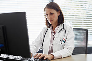 doctor checking CURES database
