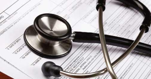 stethoscope and insurance paperwork