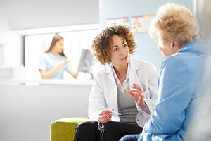 senior citizen patient and doctor